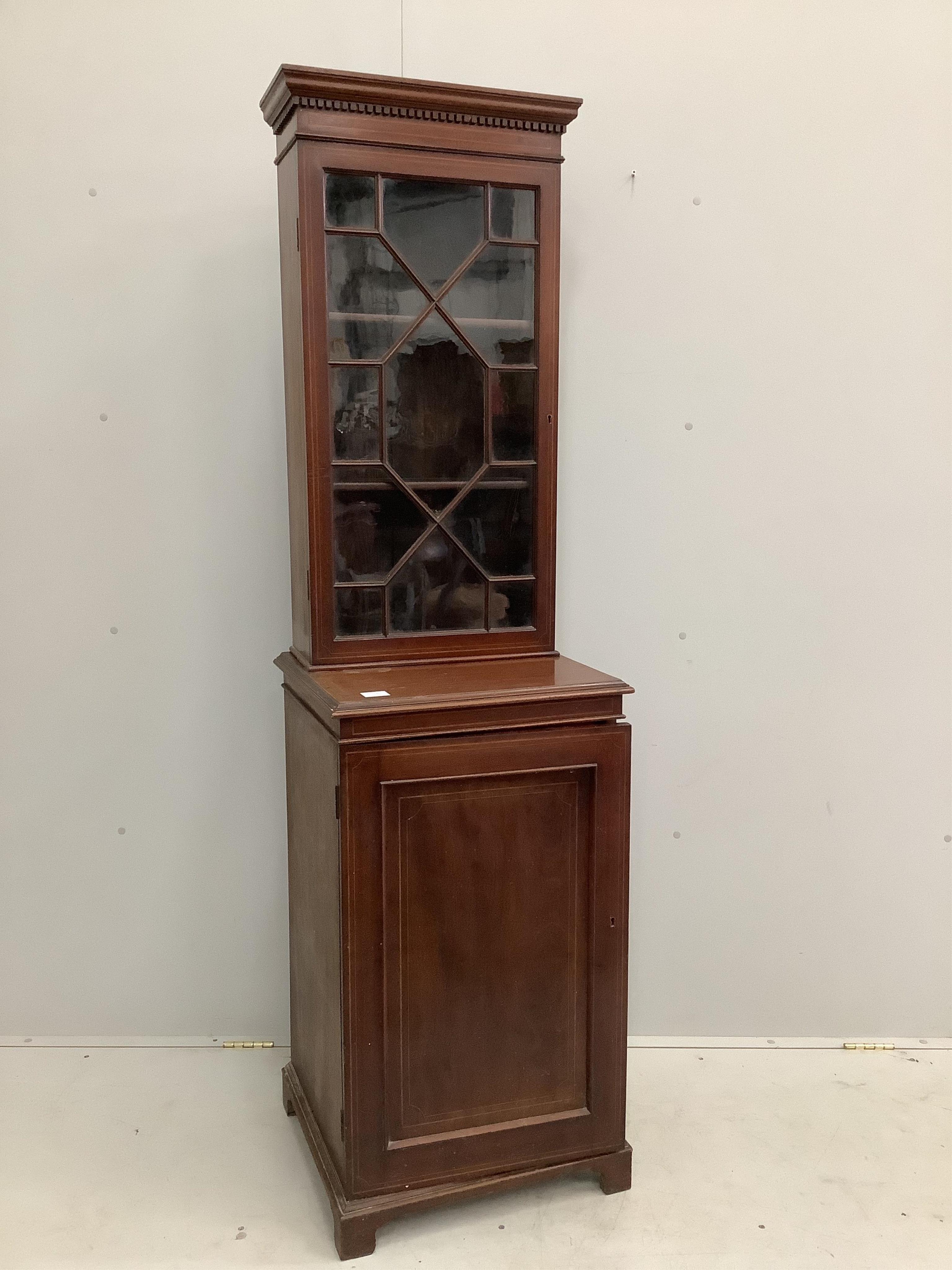 An Edwardian inlaid mahogany bookcase / collector's cabinet of narrow proportions, width 51cm, depth 46cm, height 187cm